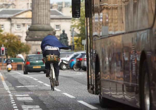 Cyclist on George Street, Edinburgh. Picture: Toby Williams