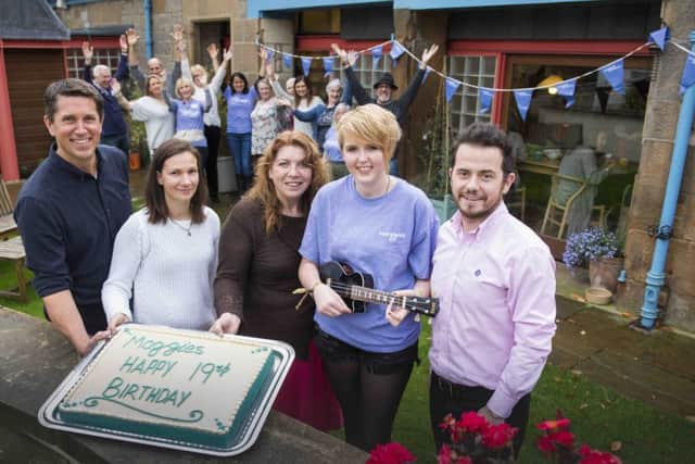 Maggie's Centre in Edinburgh celebrates 19 years with a cake, a song by Emma Milligan and a poem by Angus Ogilvie.
Pictured (l-r) Andrew Anderson (centre head), Amy Robertson (fundraiser), Yvonne McIntosh (support specialist), Emma Milligan (singer), Mark Cooper (fundraiser)

Picture: Alex Hewitt