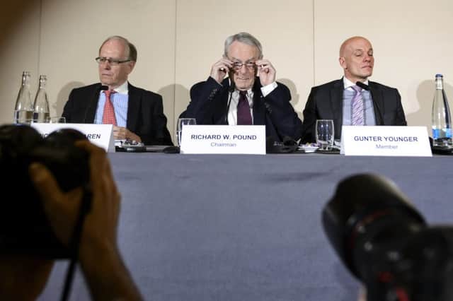 Chairman Dick Pound and members of his commission unveil their damning report on doping in sport. Picture: Getty