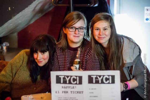 Cecilia Stamp, Amanda Aitken, and Kate Bailey, members of the TYCI collective