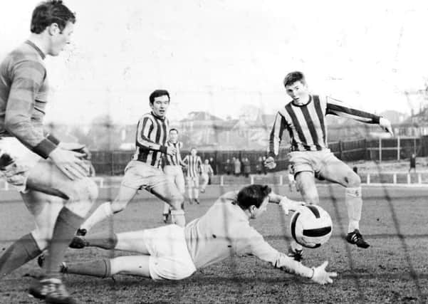 Kenny Dalglish at age 16 scoring for Cumbernauld Utd at Guys Meadow, 1967.
