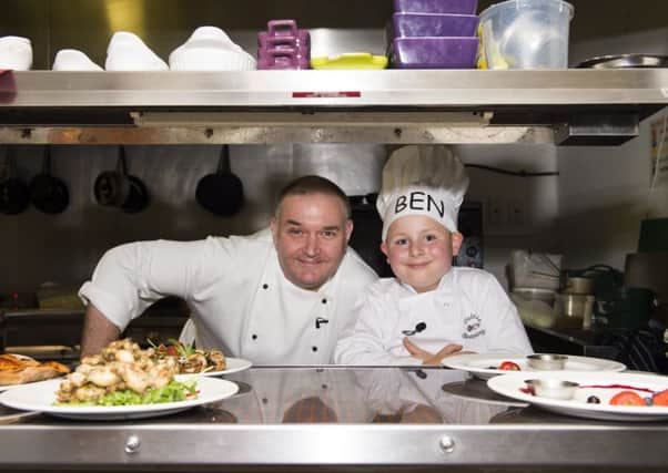 Ben and head chef Andrew Stott at Le Bistro Beaumartin Picture: Richard Campbell