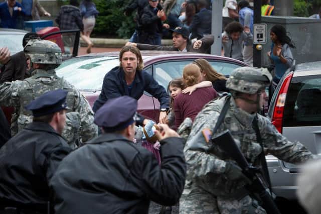 Brad Pitt starring in World War Z, a zombie action thriller partly filmed in Glasgow city centre. Picture: PA