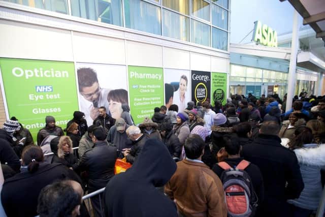 Shoppers at the Asda store in Wembley, north-west London, taking advantage of its Black Friday offers last year. Picture: David Parry/PA Wire
