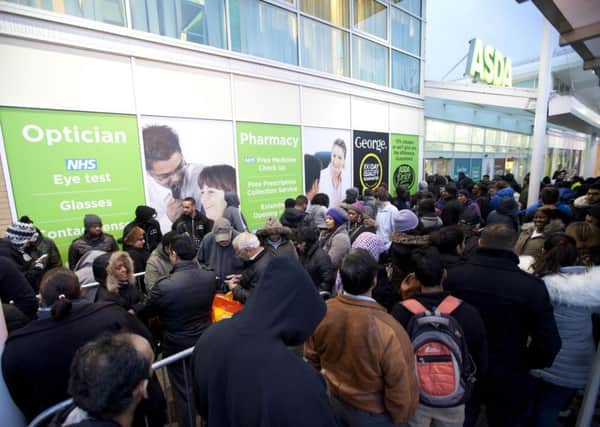 Shoppers at the Asda store in Wembley, north-west London, taking advantage of its Black Friday offers last year. Picture: David Parry/PA Wire