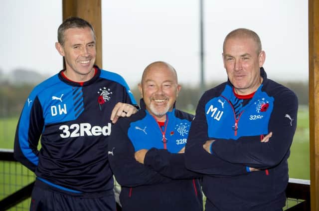 Warburton, right, with assistant boss David Weir (L) and new head of recruitment Frank McParland. Picture: SNS