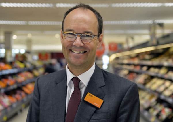 Sainsbury's boss Mike Coupe said the retail landscape remains 'challenging'