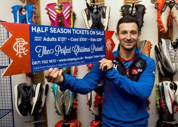 Jason Holt, in the Ibrox bootroom, promoting half-season ticket sales for Christmas. Picture: SNS Group
