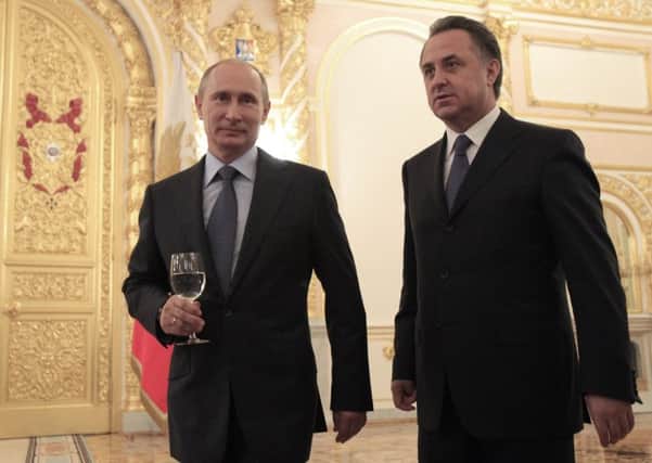 President Putin and Minister of Sport Mutko attend a farewell ceremony for Russian athletes prior to the Olympic Games in London. Picture: AFP/Getty Images