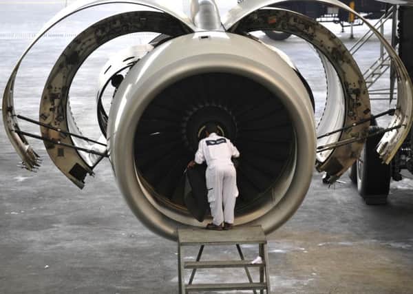 Engines maker Rolls-Royce is to cut management jobs after another profit warning. Picture: AFP/Getty