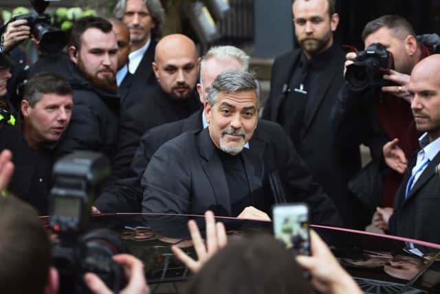 George Clooney leaves Tiger Lily restaurant in Edinburgh. Picture: Getty