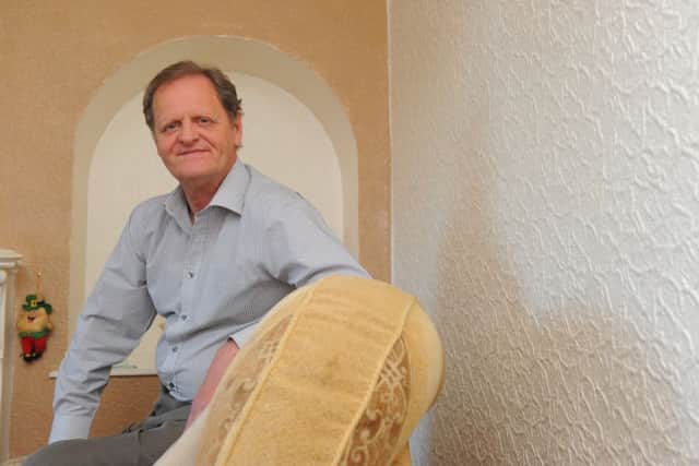 Former Morton player Andy Ritchie at home in Bellshill. Picture: Robert Perry