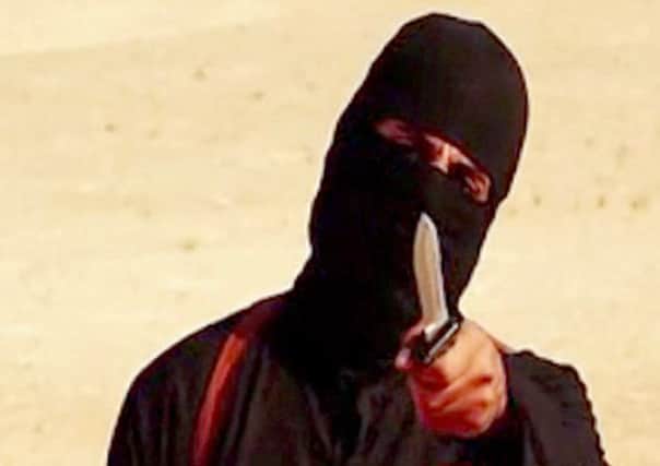 A still image taken from an IS video purporting to show Mohammed Emwazi, dubbed Jihadi John. Picture: AFP/Getty