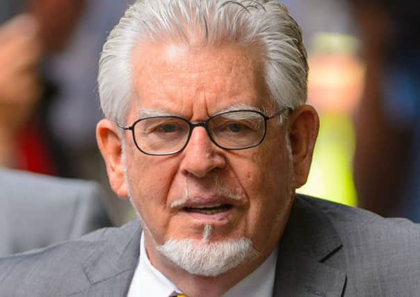 Rolf Harris has been taken to hospital after a health scare, which sources attributed to the shamed star 'overdosing on chocolate'. Picture: PA