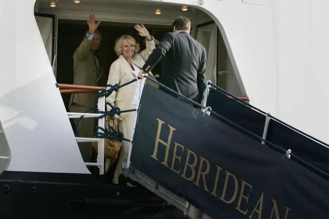 The Prince of Wales and Duchess of Cornwall wave as they board the Hebridean Princess boat at Kyle of Lochalsh to join the Queen on their summer holidays in 2006. Picture: Andrew Milligan/PA
