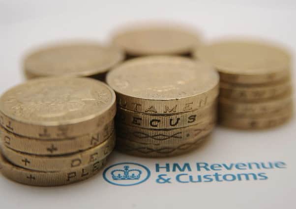 Modernisation of HMRC may save money, but the costs and benefits of reorganisation to taxpayers remain great unknowns. Picture: PA
