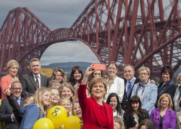 First Minister Nicola Sturgeon joins newly elected SNP MPs in South Queensferry. Picture: Hemedia