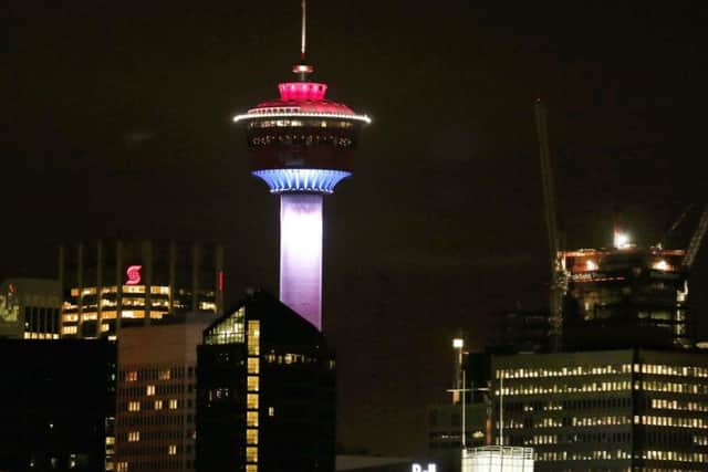 The Calgary Tower lit up with the colors of the French flag to show support and sympathy regarding the Paris attacks in Calgary, Canada. Picture: AP