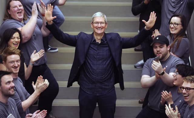 Tim Cook with staff at the Edinburgh Apple Store. The firm's chief dropped in unannounced. Picture: Neil Hanna