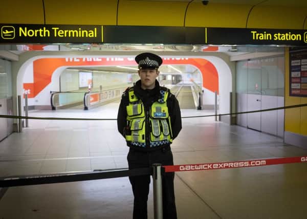 Police in attendance in Gatwick Airport after a man was detained. Picture: PA