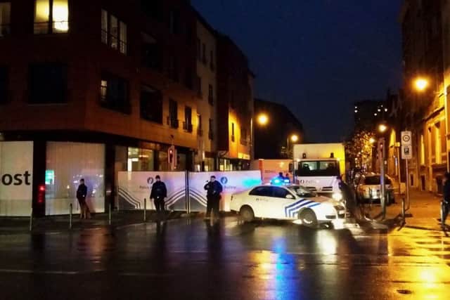 Belgian police block a street during a raid in Brussels' Molenbeek district. Picture: AFP/Getty