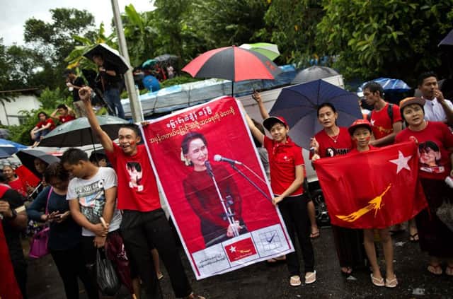 Supporters of Myanmars National League for Democracy shout slogans outside the NLD headquarters in Yangon, Myanmar. Picture: AP