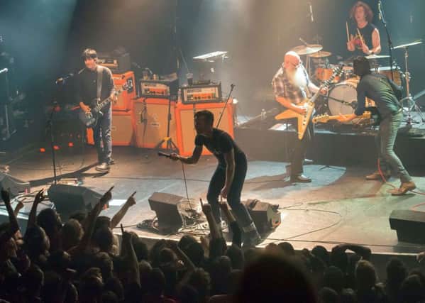 Eagles of Death Metal performing at the Bataclan, just moments before the attackers burst in. Picture: AFP/Getty