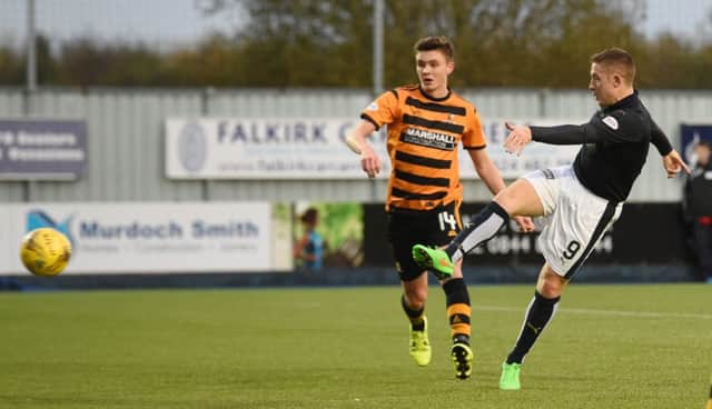 Falkirk's John Baird hammers home his hat-trick. Picture: SNS Group