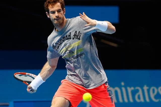 Andy Murray practises at the O2 Arena in London prior to his first match against David Ferrer. Picture: Getty Images