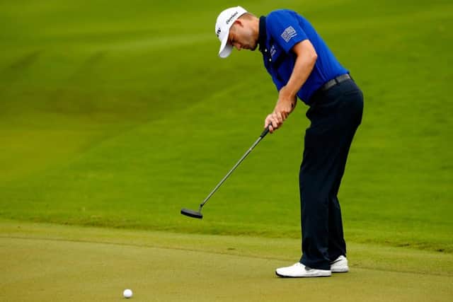 Russell Knox, who briefly held the outright lead in the OHL Classic, putts on the first hole at El Camaleon in Playa del Carmen. Picture: Getty Images