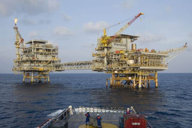 Premier Oil has agreed to sell its Norwegian arm to Det Norske