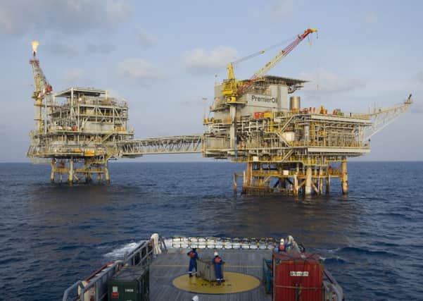 Premier Oil has agreed to sell its Norwegian arm to Det Norske