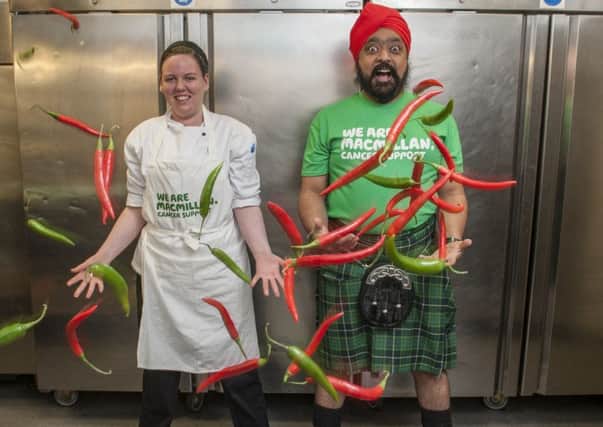 Tony Singh , pictured in a specially designed Macmillan tartan kilt, with chef Krystal Dunlop Picture:Phil Wilkinson