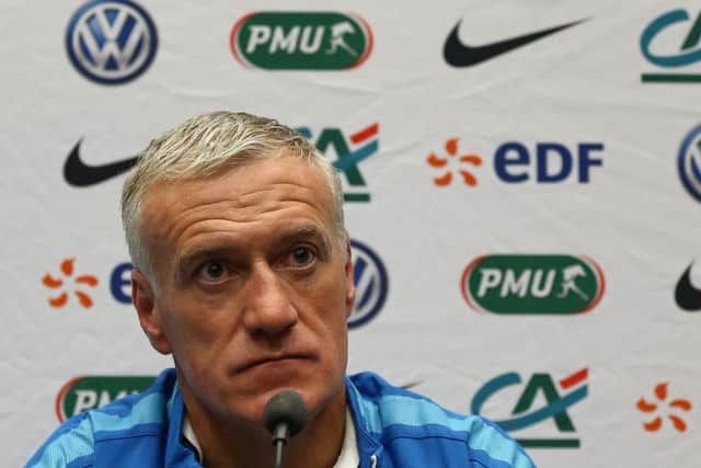 A solemn France coach Didier Deschamps faces the media at Wembley yesterday. Picture: AFP/Getty