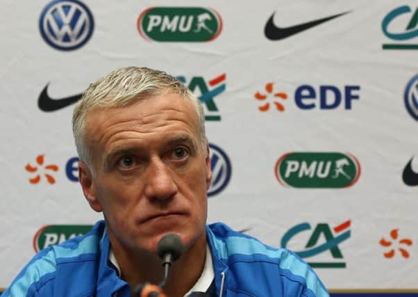 A solemn France coach Didier Deschamps faces the media at Wembley yesterday. Picture: AFP/Getty