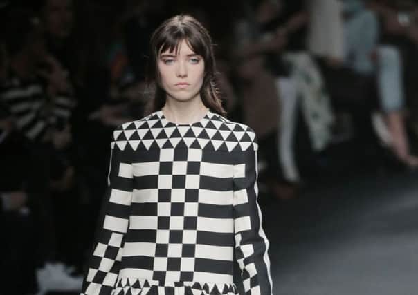 An outfit from Valentino's ready-to-wear fall-winter 2015-2016 fashion collection. Picture: PA