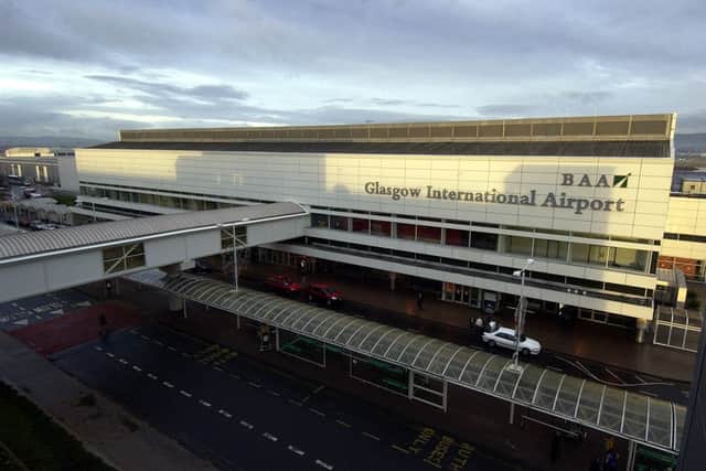 The refugees are set to arrive at Glasgow airport. Picture: Stephen Mansfield
