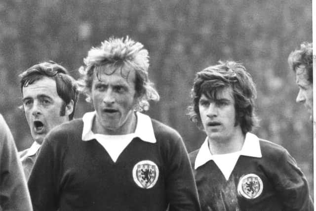 Denis Law playing for Scotland