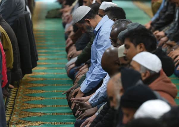 Muslims at prayer. The motive for the attack is unclear. Picture: PA