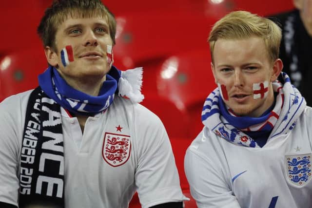 Many fans painted their faces with the French national flag. Picture: AP