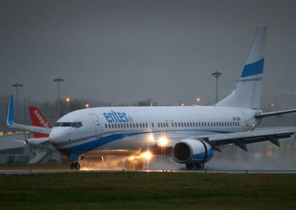 The first of a series of charter flights carrying refugees arrives at Glasgow Airport. Picture: Getty
