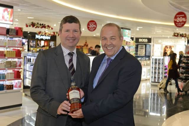 Edinburgh Airport chief executive Gordon Dewar, left, with World Duty Free director of retail operations Fred Creighton. Picture: Neil Hanna