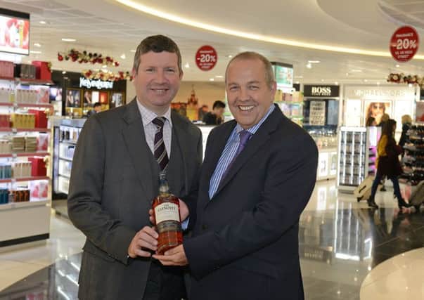Edinburgh Airport chief executive Gordon Dewar, left, with World Duty Free director of retail operations Fred Creighton. Picture: Neil Hanna
