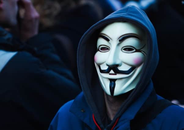 The gang were wearing 'Anonymous masks' similar to this one attacked a Dumfries home. Picture: equinoxefr/Flickr