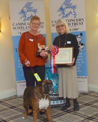 Patron Rosemary Long and Patricia McMahon with Bruce. Picture: Barking Cat Pet Photography