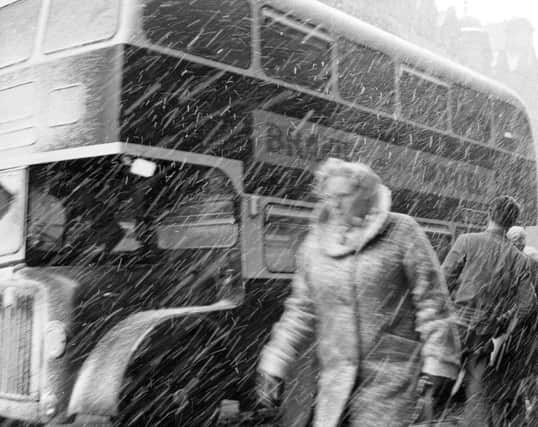 Easter blizzard in Edinburgh 1963 - Woman struggles against icy winds