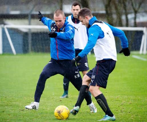 Rangers striker Kenny Miller challenges Andy Halliday in training. Picture: SNS