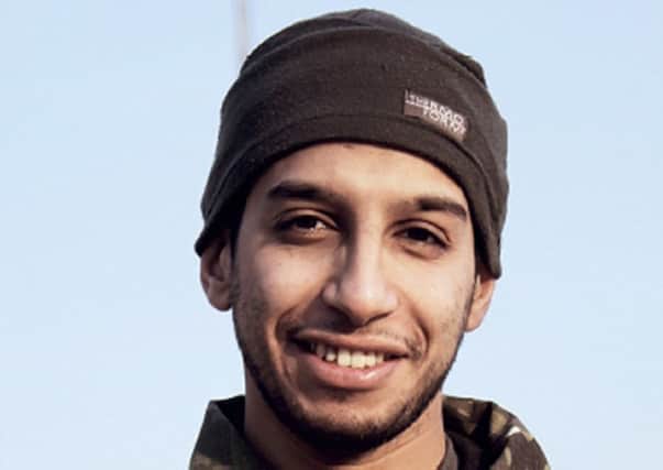 Abdelhamid Abaaoud smiles in an Islamic State magazine. Picture: AFP
