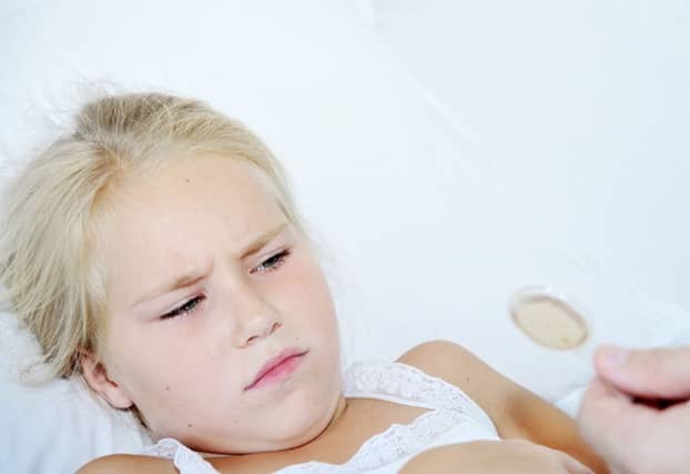 If your child is too ill to go to school, then parents are entitled to take time off work. Picture: PA