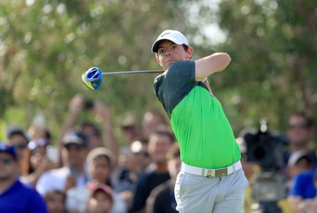 DUBAI, UNITED ARAB EMIRATES - NOVEMBER 21:  Rory McIlroy of Northern Ireland plays his tee shot on the par 4, 9th hole during the third round of the 2015 DP World Tour Championship on the Earth Course at Jumeirah Golf Estates on November 21, 2015 in Dubai, United Arab Emirates.  (Photo by David Cannon/Getty Images)